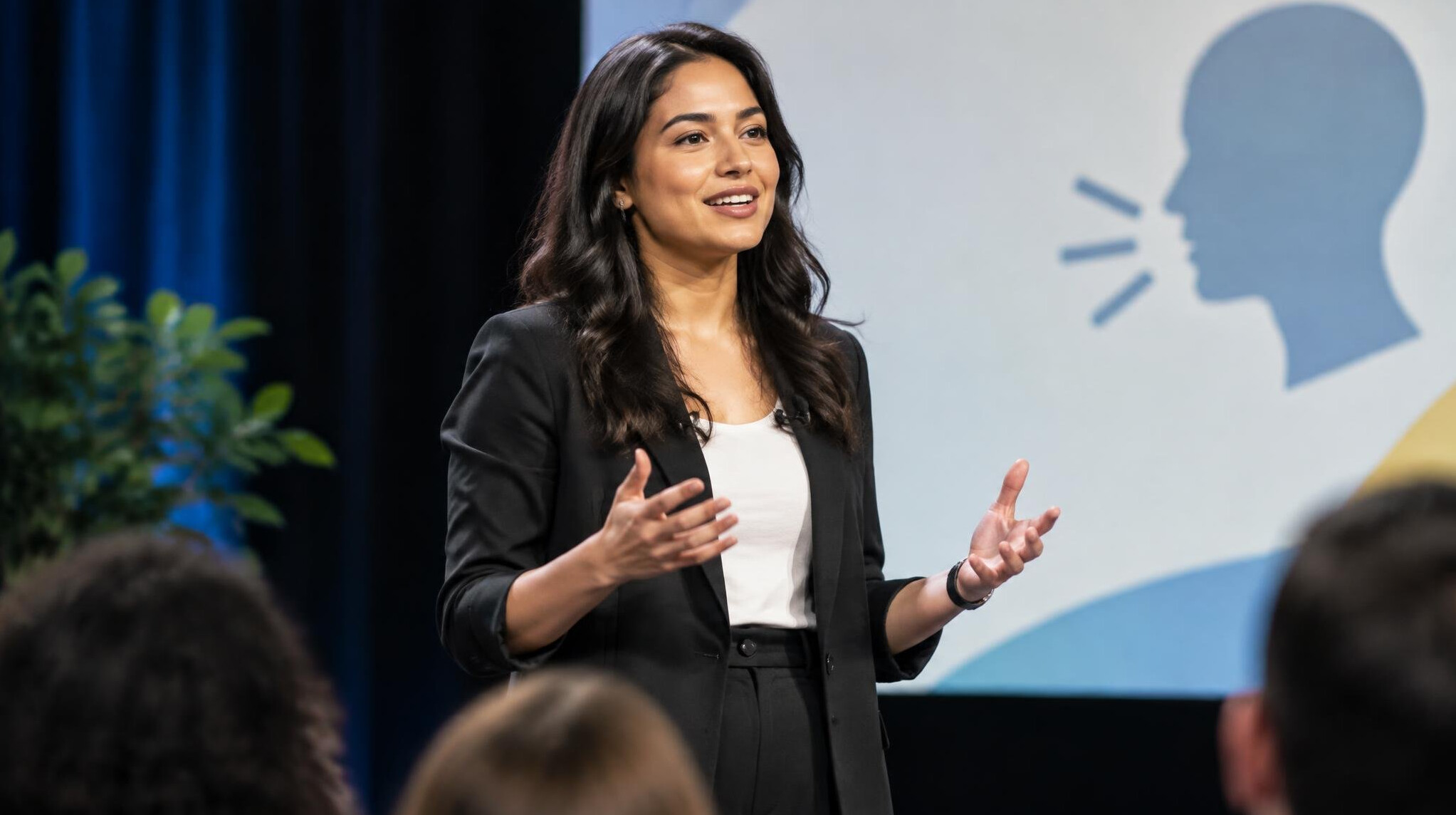 person speaking confidently on stage