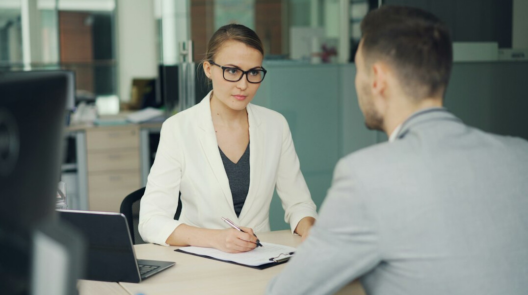 woman listening to colleague