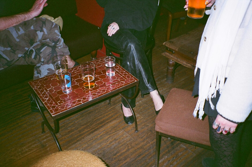 Group of people discussing around a table